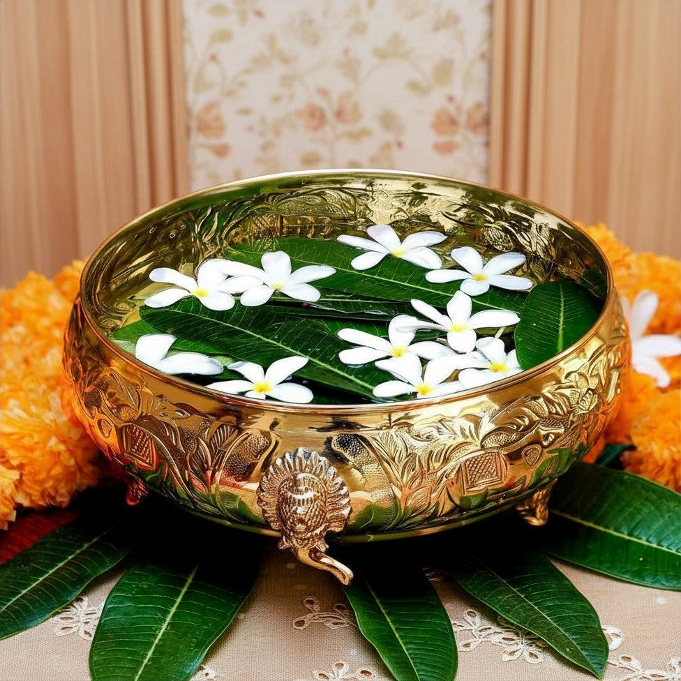 Click to see full view   2 VIDEOS     4+ BEHOMA Ethnic Carved Elephant Design 12 Inch Brass Urli Decor Bowl, Golden Center Table Flower Decorative Bowl for Home Decor, Urali for Diwali, Navratri Pooja, Durga Puja & Deepawali Decoration, 1 pc